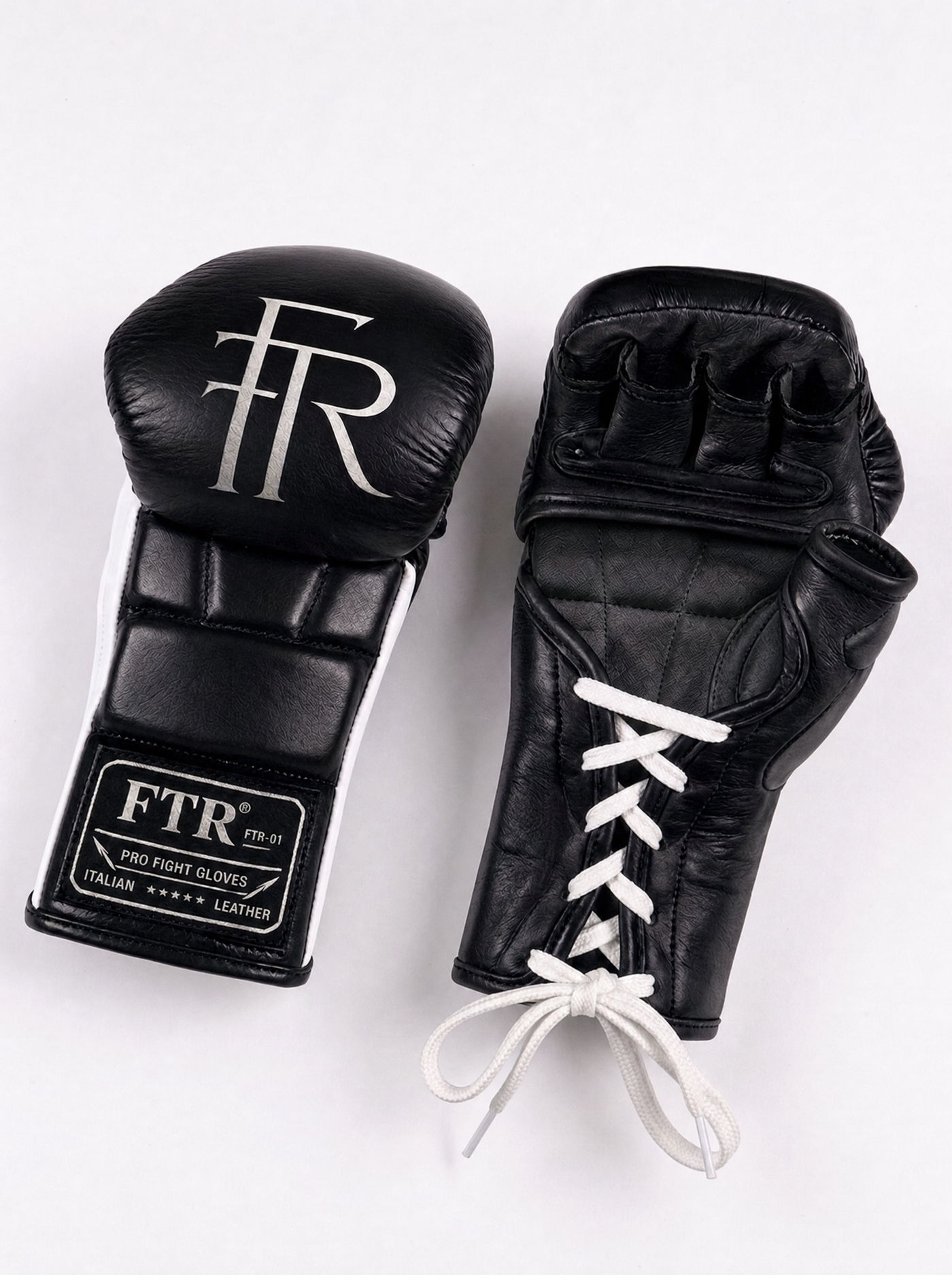 FTR-01 lace-up MMA gloves laid flat, second angle